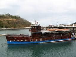 The Isla Morada boat, which belonged to U.S. mafioso Al Capone, now ferries tourists across the Panama Canal, which it has transited more than any other vessel. 