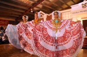 The winners display their beautiful red and white polleras in Las Tablas, Panama